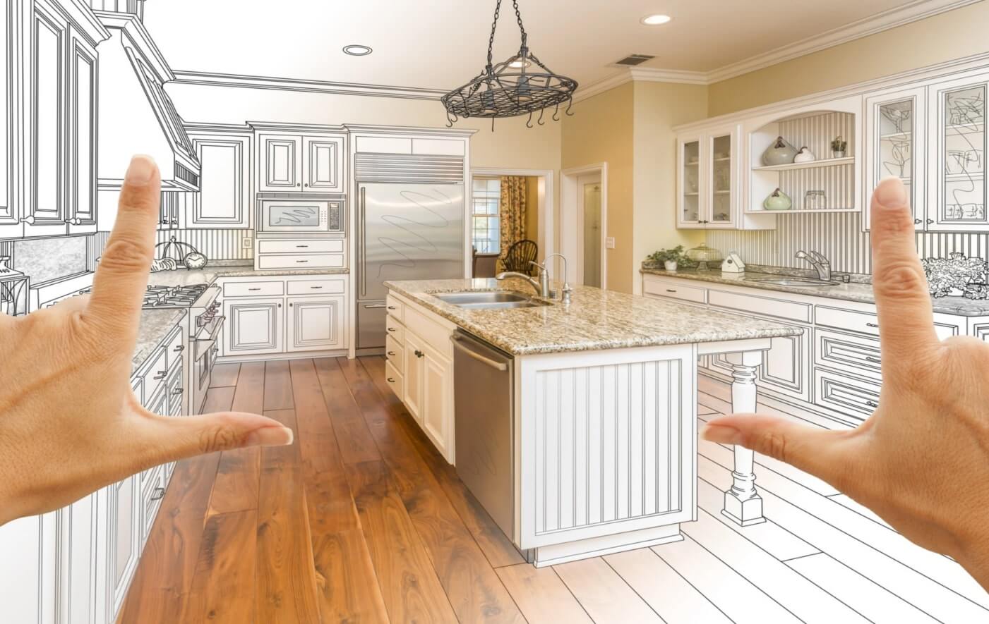 home renovation plan with two hands positioned in picture sign
