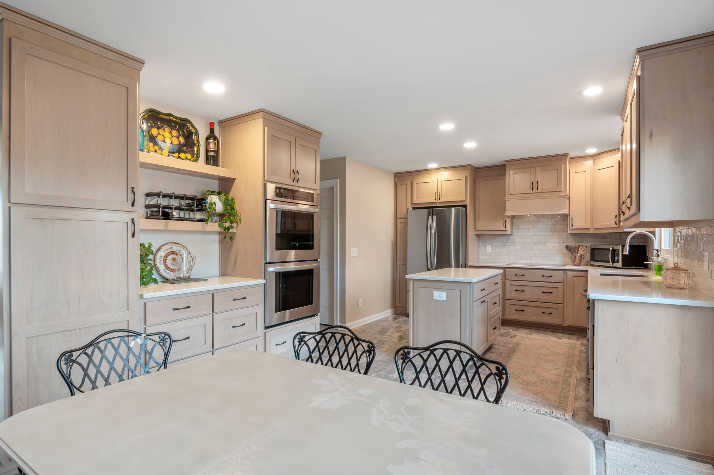 Kitchen remodeling job with table and chairs